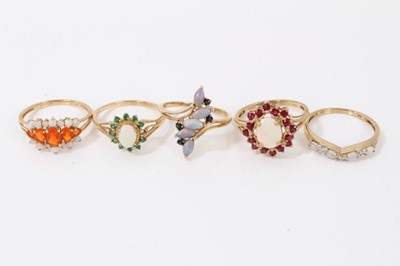 Lot 83 - Five 9ct gold opal and gem set dress rings