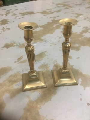 Lot 273 - Pair of Georgian brass candlesticks