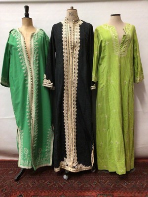 Lot 2125 - Three kaftan robes with embriodered fronts plus a long lrngth green Chinese silk brocade evening coat.