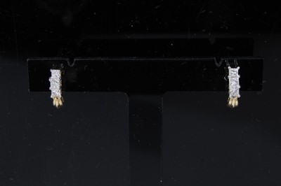 Lot 300 - Pair 14ct gold diamond earrings