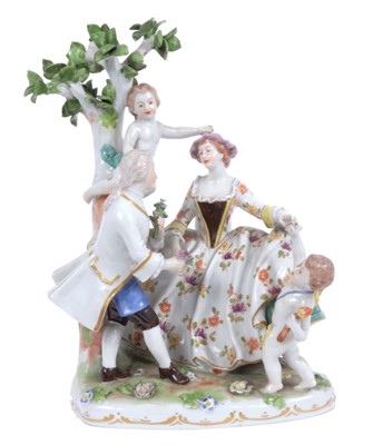 Lot 224 - Vienna porcelain group, late 19th/early 20th century, in the form of a courting couple and two putti, beehive mark to base, 25.5cm high
