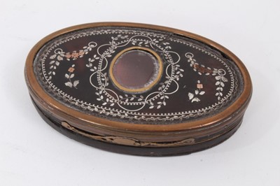 Lot 897 - 18th century oval silver and copper inlaid tortoiseshell snuff box