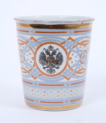 Lot 96 - Imperial Russian Tsar Nicholas II Coronation 1896 enamelled commemorative 'blood cup' beaker transfer decorated with the Imperial Russian eagle and Tsar Nicholas II cipher, on red,white and blue p...