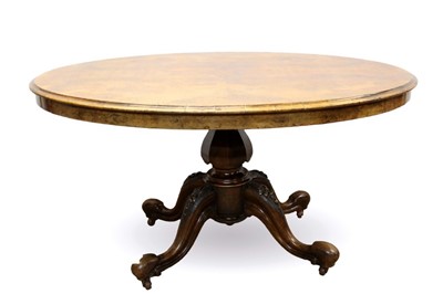 Lot 1474 - Victorian burr walnut breakfast table, with quarter veneered tilt top on facetted vase column and quadruped cabriole legs on castors, 136 x 110cm
