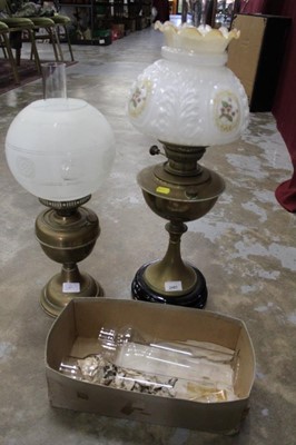 Lot 2481 - Early 20th century brass oil lamp together with another (2)