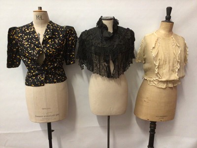 Lot 2143 - Group of vintage clothing including a Goringers pink quilted jacket, printed silk dressing gown, 1920's lurex slip dress, red wool cape with cream embriodery, Victorian black lace capelet, beaded...