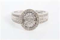 Lot 3338 - White gold (9ct) diamond set cocktail ring...