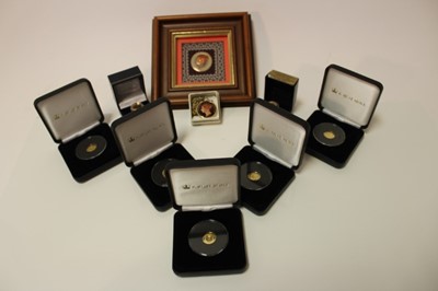 Lot 421 - World - Mixed coins to include G.B. Gold Quarter Sovereign 2009 set in yellow metal ring, Tristan Da Cunha 9ct Gold coins x 5 (N.B. each weighing 1gm), An enamelled Victoria Half-Farthing 1844 set...
