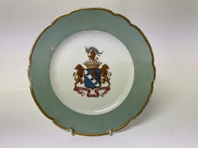 Lot 66 - Antique porcelain plate with painted coat of arms, coronet and motto, 22.5cm diameter