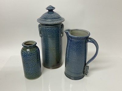 Lot 69 - Three salt glazed pieces of Deborah Baynes studio pottery including lidded storage jar, 29cm high, jug and a vase, 15.5cm high