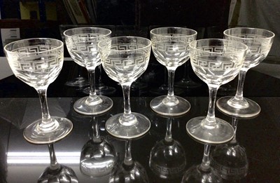 Lot 52 - Set of six Edwardian cut glass port/sherry glasses with cut and etched Greek key borders