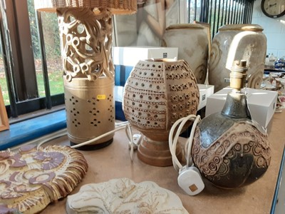 Lot 1210 - Two Bernard Rooke pottery lamps, together with a similar studio pottery lamp measuring 56cm high (3)