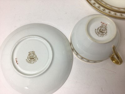 Lot 68 - Adderleys Ltd. porcelain teaset, Rouen pattern eleven place setting with two cake plates, milk jug and sugar bowl, each decorated with borders of fleur-de-lis (37 pieces)
