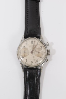 Lot 185 - 1950s Leonidas stainless steel chronograph wristwatch, inner back case numbered 805145, on black leather strap