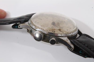 Lot 185 - 1950s Leonidas stainless steel chronograph wristwatch, inner back case numbered 805145, on black leather strap