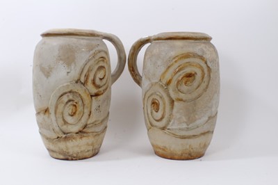 Lot 1225 - Large pair of Bourne Denby pottery jugs, with coiled circle pattern in relief, 36.5cm high