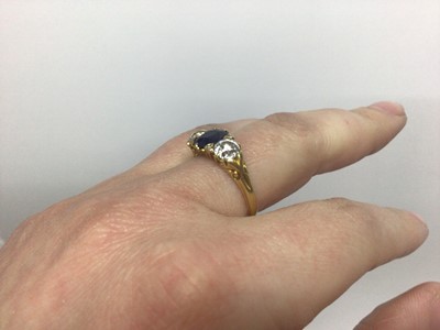Lot 595 - Late Victorian diamond and sapphire three stone ring