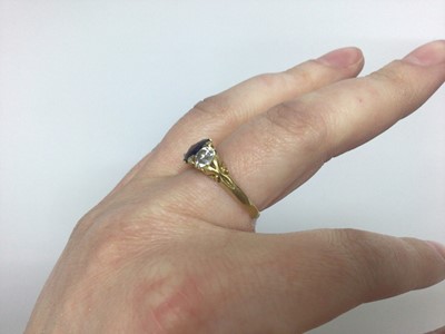 Lot 595 - Late Victorian diamond and sapphire three stone ring