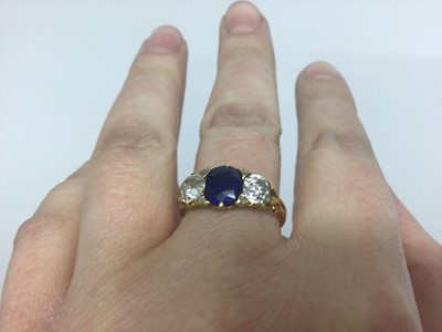 Lot 595 - Late Victorian diamond and sapphire three stone ring