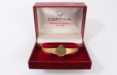 Lot 250 - Ladies Certina 18ct gold wristwatch on integral gold bracelet