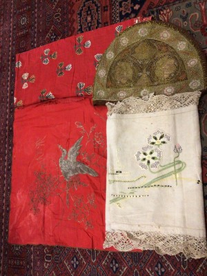 Lot 2184 - A box of linen and lace including Chinese embroidered square,  red cotton panel with hand embroidered stylised flowers