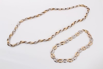 Lot 263 - 9ct white and yellow gold link chain and similar style bracelet