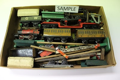 Lot 1892 - Suitcase containing O gauge railway, locomotive, carriages and accessories, meccano set and building blocks