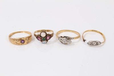 Lot 235 - Antique 12ct gold gem set ring and three 18ct gold gem set rings (4)