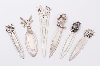 Lot 280 - Six silver novelty bookmarks each mounted with a bear, owl, fairy, sunshine, dove and horse with horseshoe