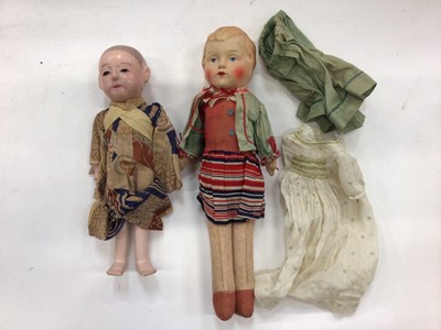 Lot 1756 - Small early mohair teddy bear with black boot button eyes, a celluloid doll in original clothing and an Oriental boy doll.
