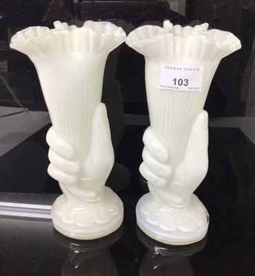 Lot 103 - Pair of Victorian opaque glass vases, in the form of a hand holding a flower, 21.5cm high