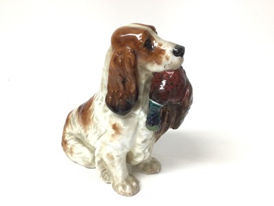 Lot 121 - Royal Doulton figure of a spaniel with a pheasant in its mouth, 13.5cm high