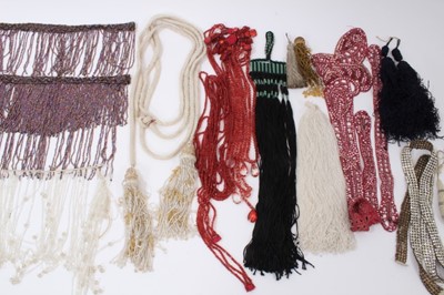 Lot 2164 - A selection of 1920s and 30s dress details and embellishments.  Including 1920's bead sautoir necklace with long tassels, pink sequin and bead dress detail, long red bead detail possibly for the...
