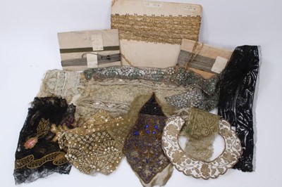 Lot 2166 - A selection of antique metallic 'gold' and 'silver' thread work items including lengths of cords and trim, lengths of lace with green paste stones, other metallic lace, black lace with silk and bul...