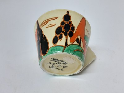 Lot 1264 - Clarice Cliff Bizarre range Fantasque milk Jug and cup (2)