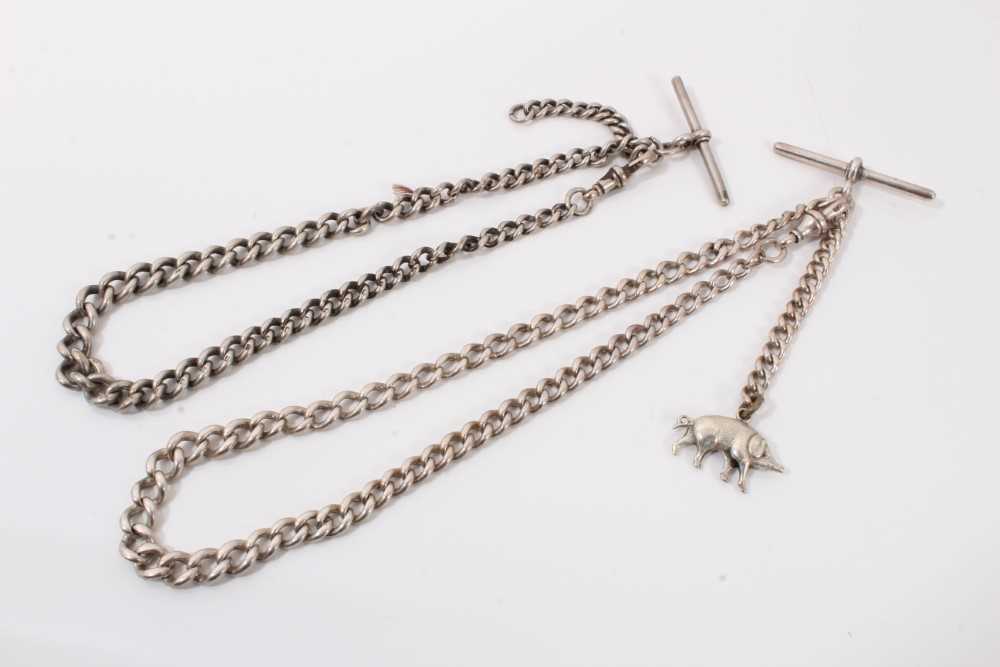 Lot 325 - Two silver watch chains, one with a pig charm