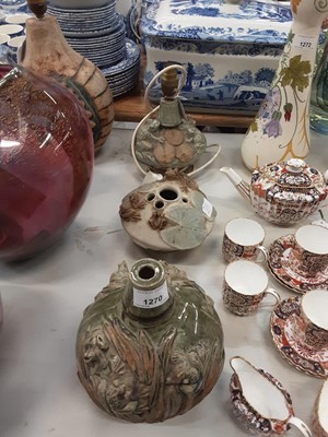 Lot 1270 - Two Bernard Rooke pottery lamps decorated with frogs, 22cm high and 16cm high, together with a vase, 13,5cm high (3)