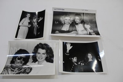 Lot 1599 - Michael Jackson Twelve 1980's Black and White Press Release photographs.  Michael Jackson with various stars including Liz Taylor, Diana Ross 1981,Whitney Houston, Brooke