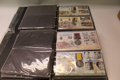 Lot 1361 - World mixed stamp and war related medal covers contained in five presentation albums (qty)