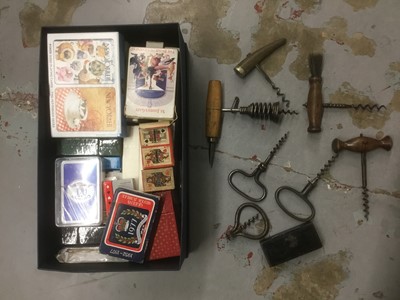 Lot 2535 - Collection of antique corkscrews, together with a collection of various 20th century playing cards, miniature dominoes in a 19th century papier mache snuff box