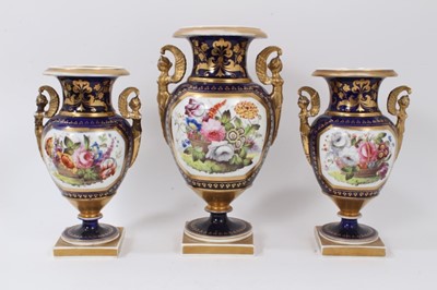 Lot 141 - 19th century English porcelain garniture of three vases