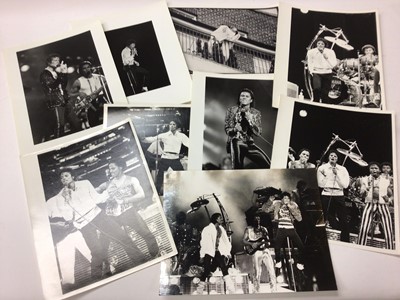 Lot 1600 - Michael Jackson Ninteen 1980's Black and White Press Release photographs by named photographers, Michael Jackson in London with fans, crowds, at Madame Tussauds Wax Works.  Photographers include...