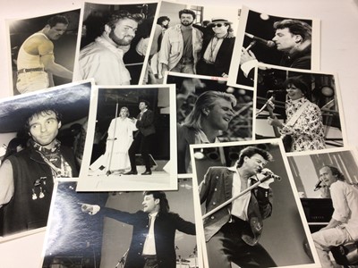 Lot 1607 - Photographs  - Quantity of 1980's Pop Star Portrait and Live Aid Press release and other photographs.  Stars include Freddie Mercury, David Bowie, Bob Geldof, Adam Ant, George Michael, Elton John e...