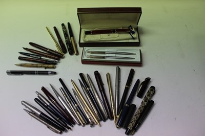Lot 2576 - Large collection of over 30 fountain and ball point pens together with propelling pencils to include Waterman and Parker (1 box)