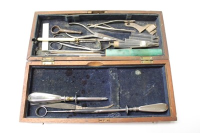 Lot 2572 - A surgical knife with ebony handle, signed Evans, together with an enema and assorted medical / dental instruments, including two trocars with silver cannulae