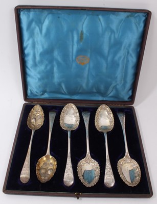 Lot 394 - Pair Georgian silver berry spoons together with four Victorian silver plated tablespoons in fitted case
