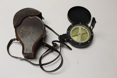 Lot 2575 - Leather cased prismatic surveying compass with black lacquered finish
