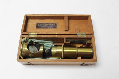 Lot 2599 - Student microscope in box, with label reading E.A. Pouzet, Opticien, Nice et Geneve