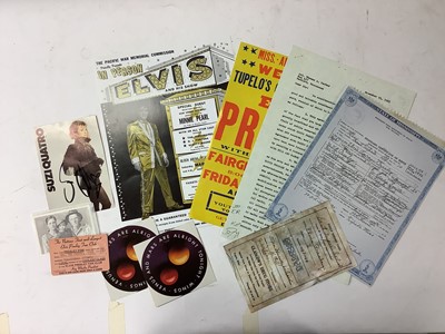 Lot 2331 - Box of assorted music related items to include Suzi Quatro signed photograph, Bruce Springsteen LP, Beatles and Queen related items (1 box)