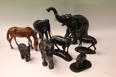 Lot 2649 - Large carved Ebony Elephant together with a group of other carved wood animals (qty)